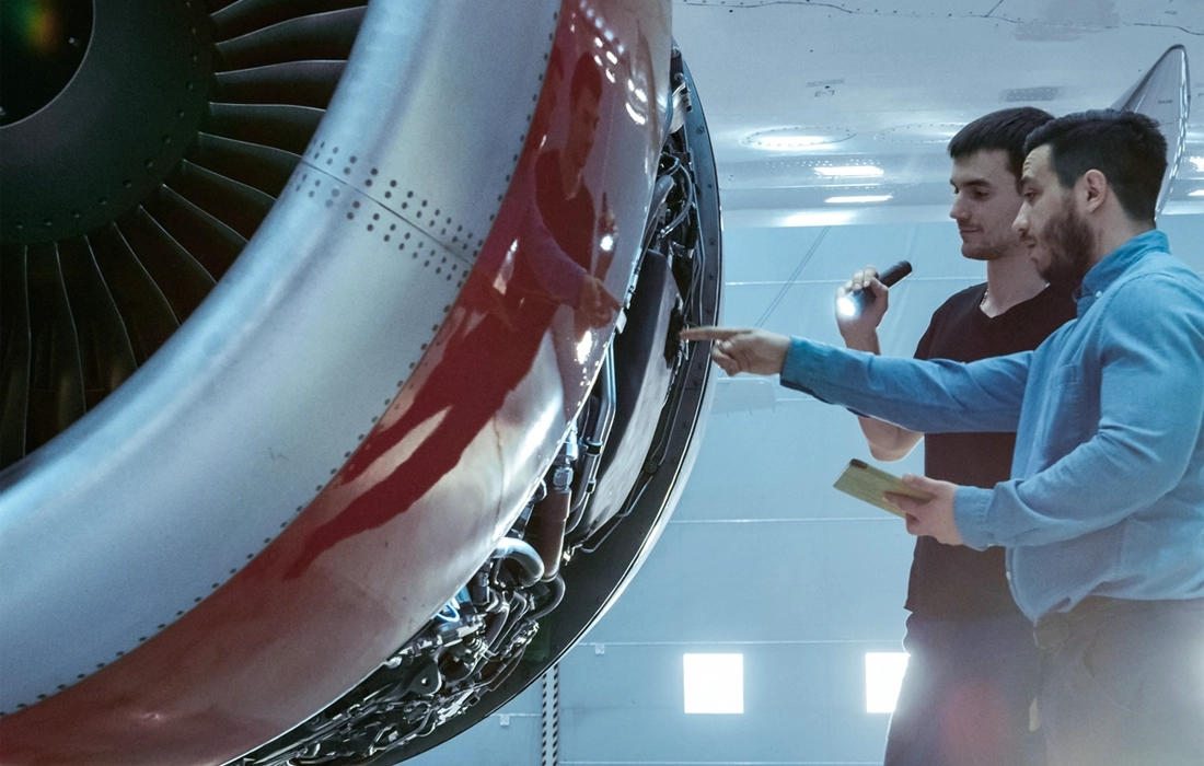 inspecting jet engine