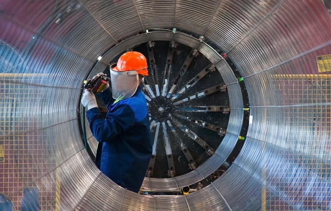worker inspecting equipment