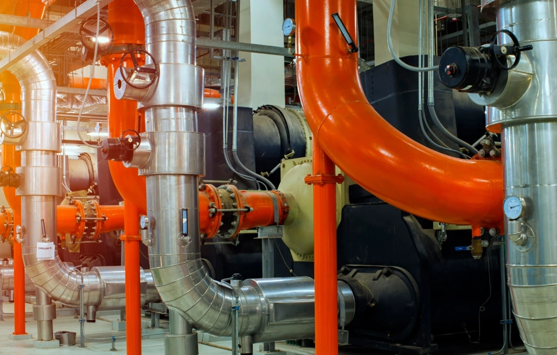 industrial piping system with orange pipes